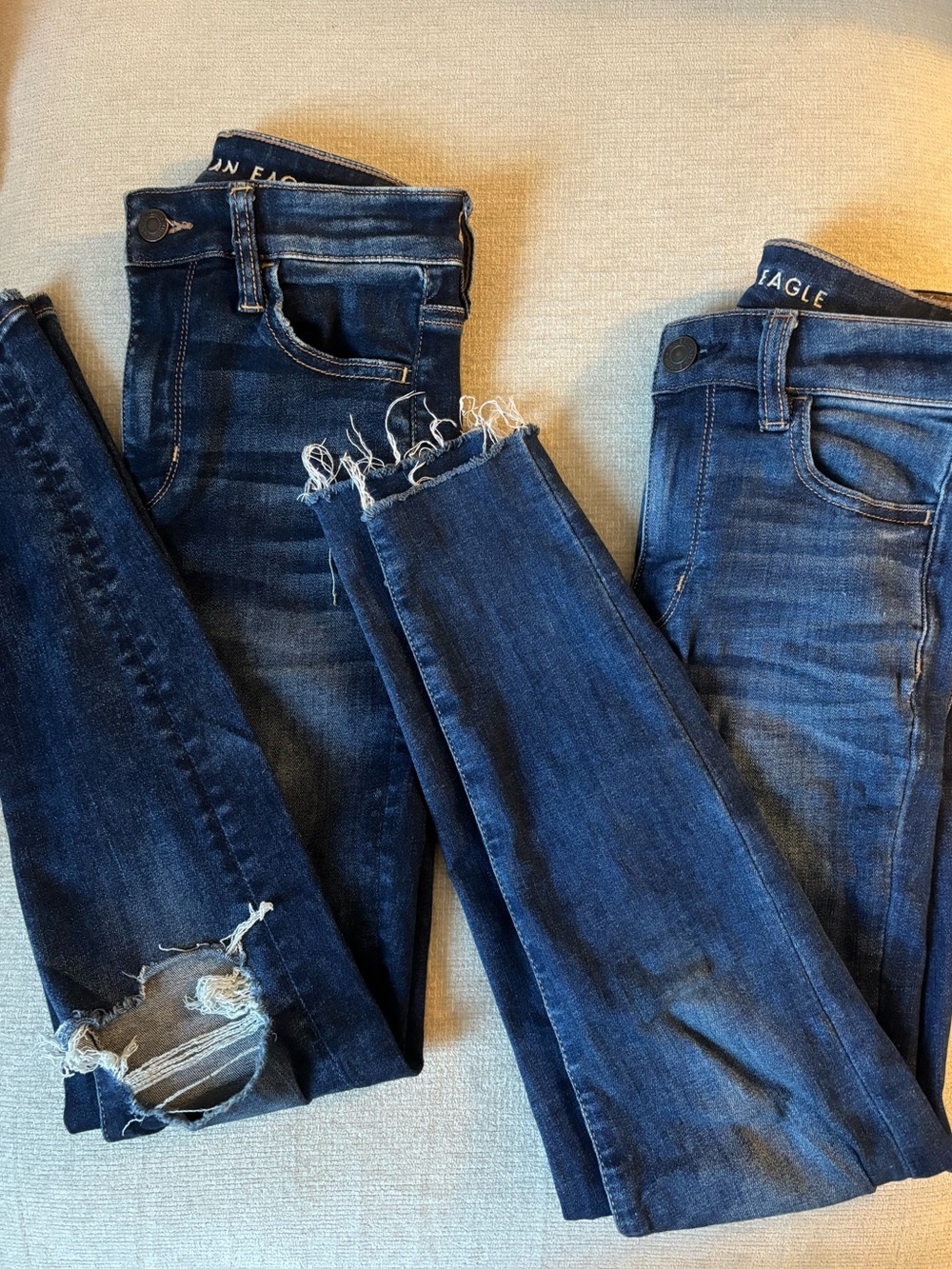 American Eagle Outfitters Dark Blue Skinny Jeans with Distressed Hem